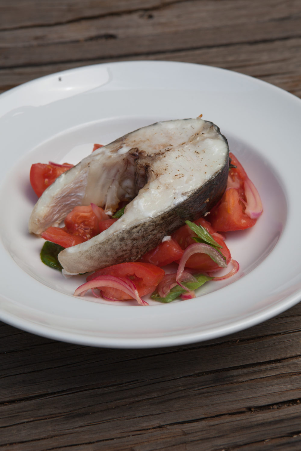 BBQ Aquna cod cutlet with summer tomato salad