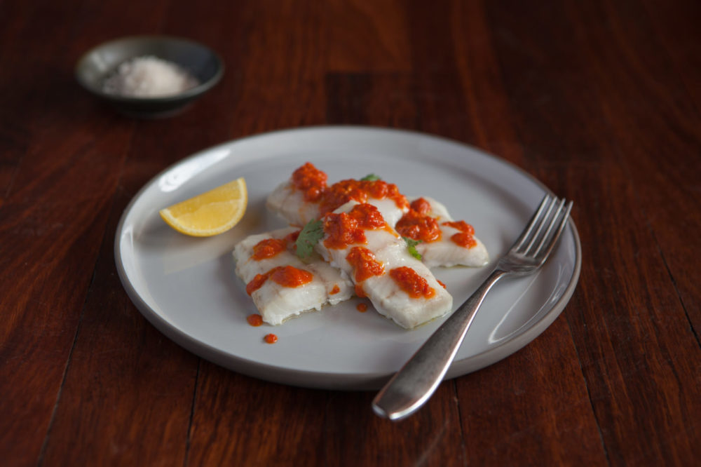 Baked Aquna cod with piri-piri sauce