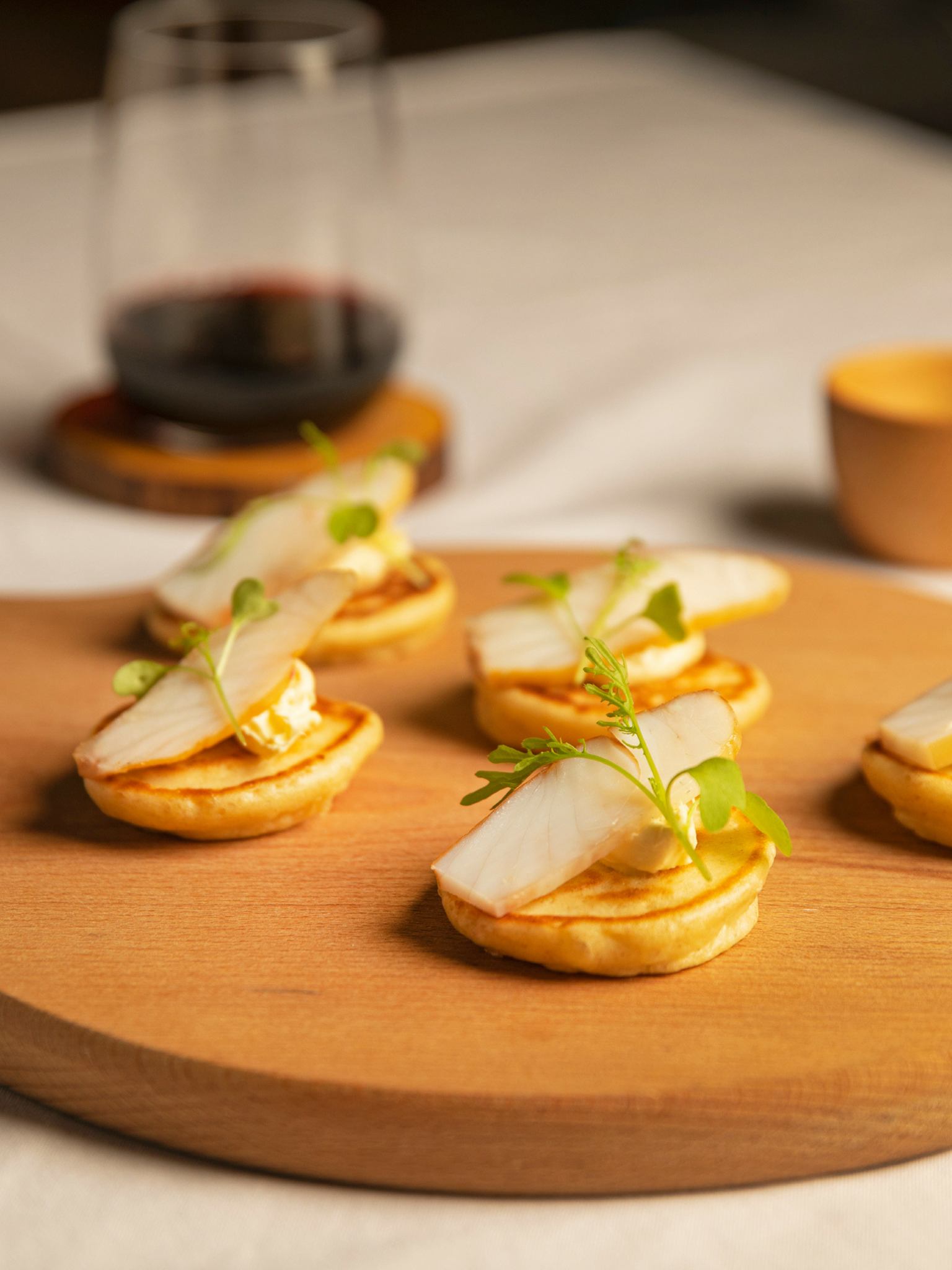 Smoked Aquna Murray Cod, buckwheat blinis, crème fraiche