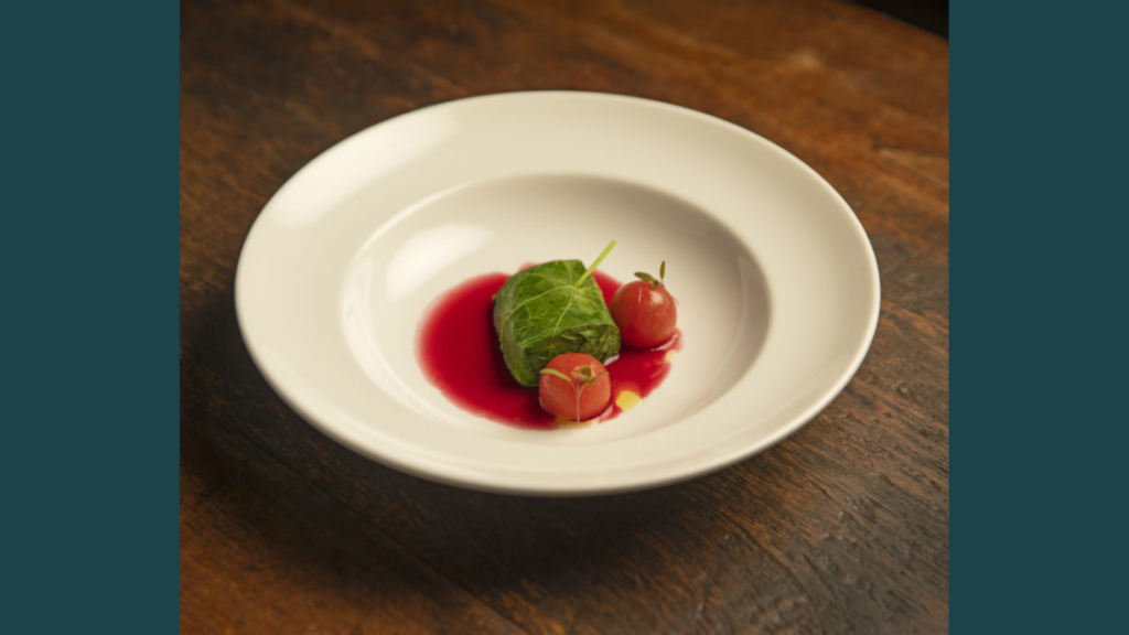 Steamed Aquna Murray Cod Wrapped in Nasturtium Confit Tomatoes and Beetroot Dashi