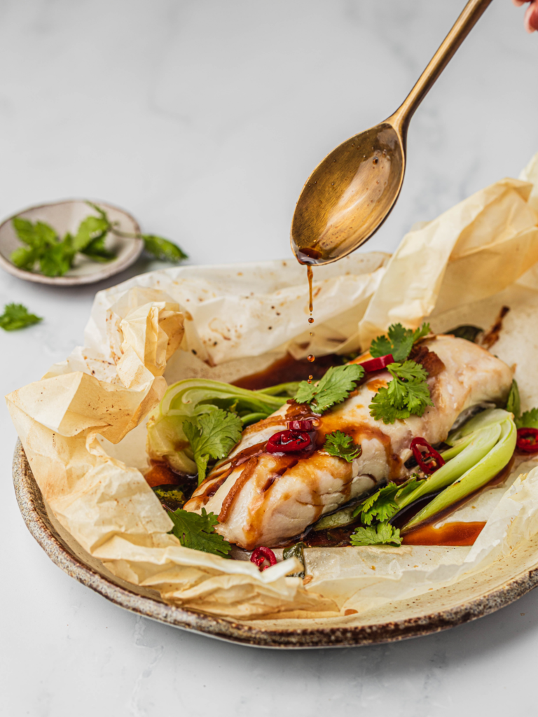 Baked Aquna parcels with ginger and soy sauce